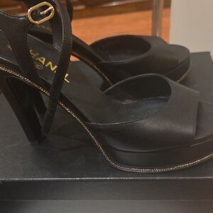 CHANEL Elegant Black Heels with Gold Trim